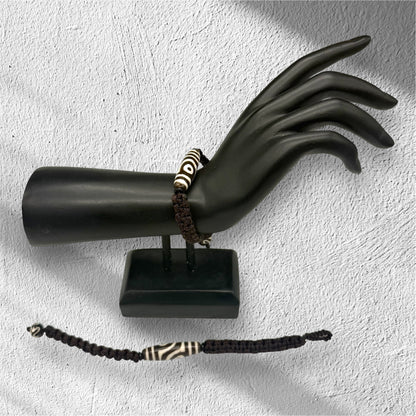 Dzi-Perlen Armband, robustes geflochtenes Band.