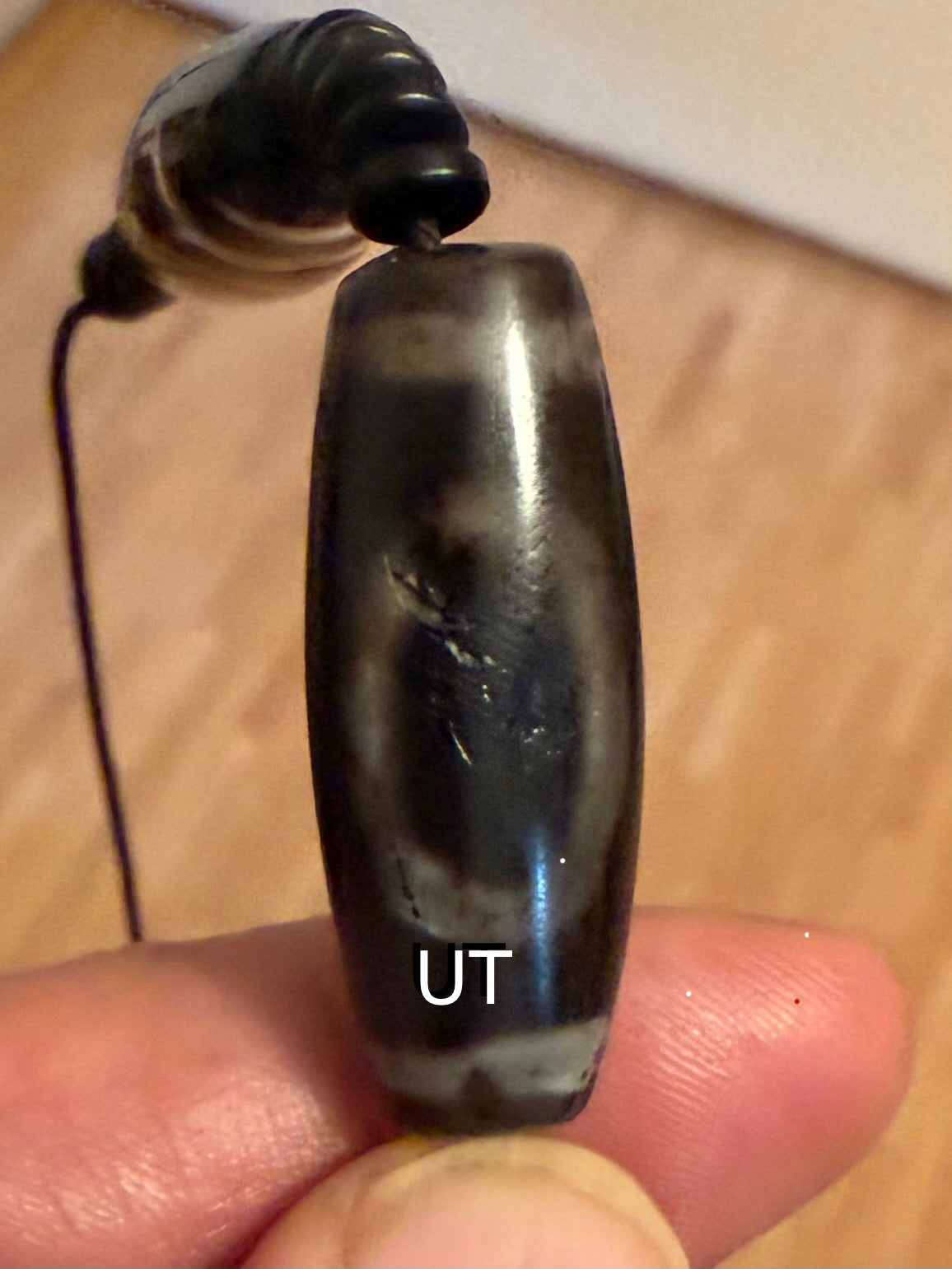 Hier zeigt eine Dzi-Perle namens Sakor Namkor mit Größe. Himmel Erde Tor samkor namkor