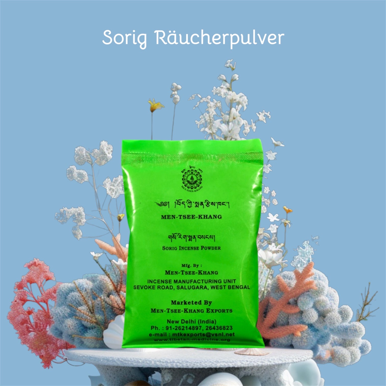 Sorig-Duftpulver in grüner Verpackung mit blauem Hintergrund, umgeben von getrockneten, pflanzenähnlichen Korallenzweigen.